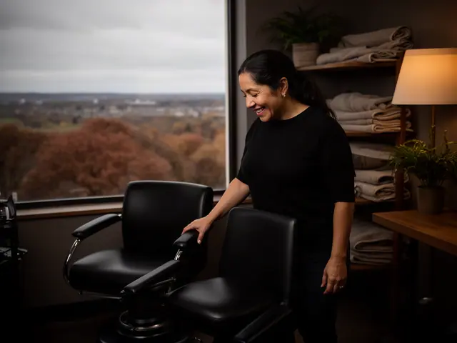 A woman with long dark hair in a low ponytail beside new equipment in a small hair salon.
